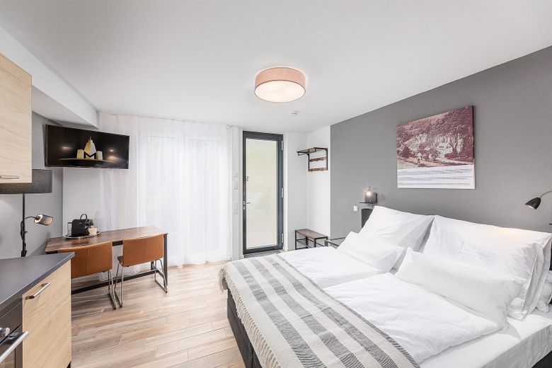 Neubau: vollmöblierte Businessapartments mit Panoramablick – Apartment 5 Wohnbereich