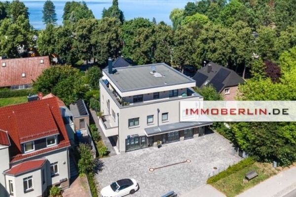 IMMOBERLIN.DE - Exzellentes KfW-55-Wohn-/Geschäftshaus mit Seeblick-Wohnung