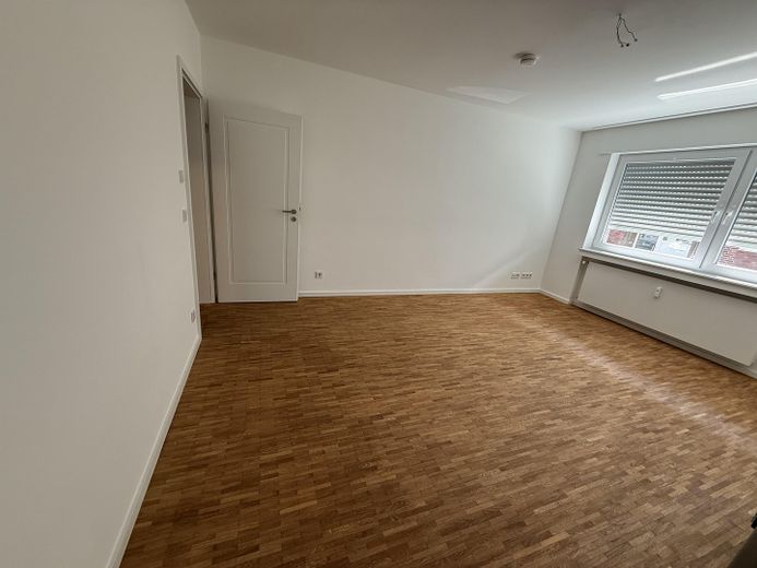 Luxuswohnung ,Hochparterre, mitten im Kreuzviertel – Das Wohnzimmer 