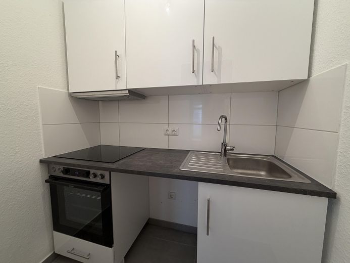 Küche mit Einbauküche 