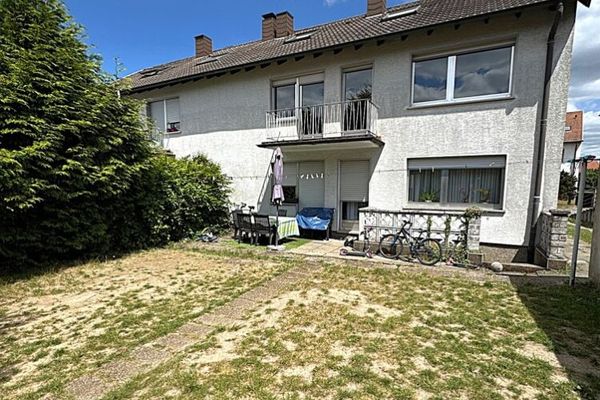 2 tot 3-gezinshuis met tuin + garage op een goede locatie in Sulzbach