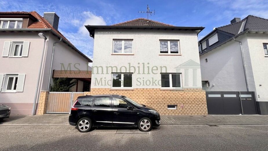 ** Charmantes Einfamilienhaus in zentraler Lage in Lampertheim - viel Platz für die ganze Familie ** – Hausansicht 1
