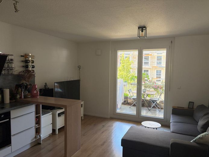 Wohnzimmer mit Küche