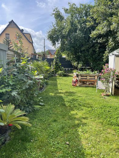 Sorglos-Investment mit Rendite-Booster: zwei vermietete 2-Zimmer-Wohnungen nahe Leipzig! – Gartenansicht