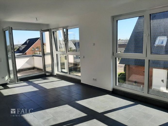 Einziehen &amp; wohlfühlen: Moderne Wohnung mit Balkon und energetischen Bestwerten in Laggenbeck – Wohnzimmer
