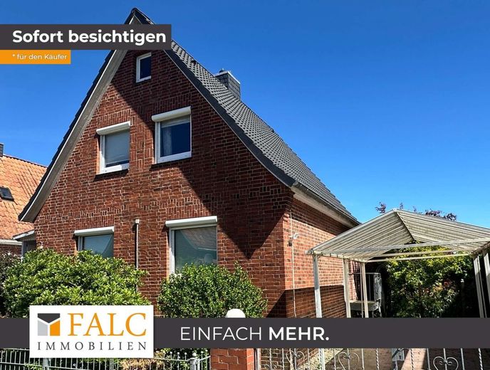 Charmantes Einfamilienhaus mit schönem Ambiente in Grünendeich – Außenansicht