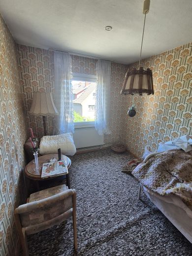 Charmantes Einfamilienhaus mit traumhaftem Südgarten, Wintergarten und Doppelgarage – Kinderzimmer DG