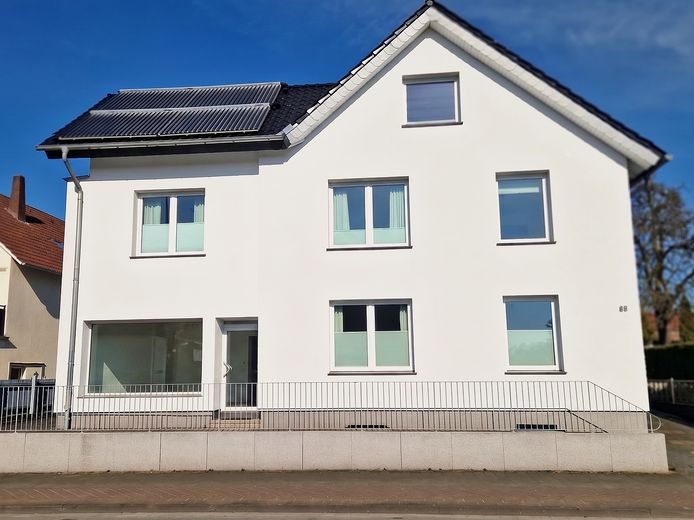Hochwertig sanierte 5 Zi.- ETW in Gütersloh - Dachterrasse, Doppelgarage – Außen 1