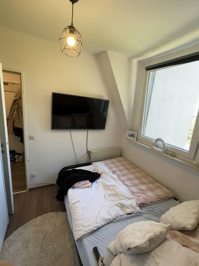Appartamento con 2 locali nel cuore della città – Schlafzimmer