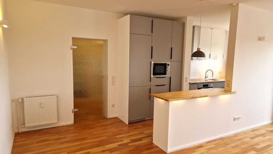 Wohnzimmer mit Küche