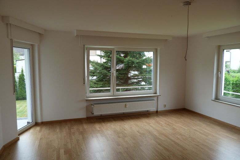 4-Familienhaus in Top-Lage von Oberursel – solide Kapitalanlage mit Mietsteigerungspotenzial – Wohnzimmer