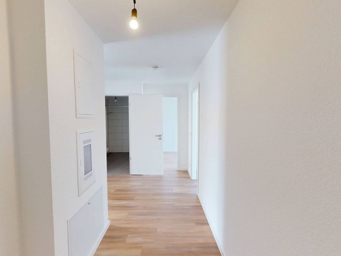 Appartement neuf moderne de 3 pièces avec cuisine équipée et BALCON ensoleillé – Flur