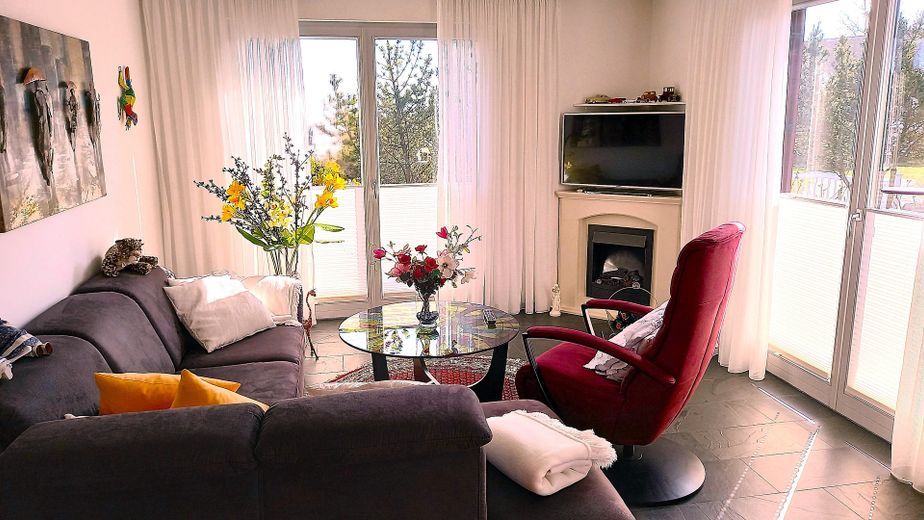 Wohnzimmer mit E-Kamin