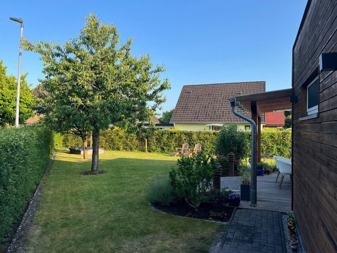 Charming end-terrace house with generous plot in Kaltenkirchen – Eingang zum Garten