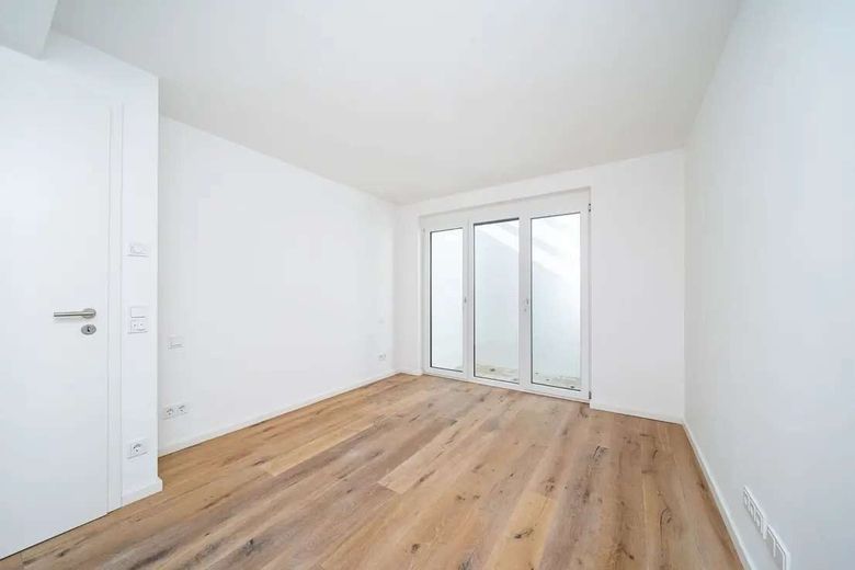 Moderne Garten- Maisonette mit außergewöhnlichen Lichthöfen – Schlafzimmer 1