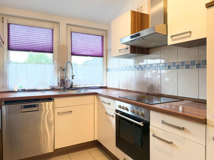 Bien immobilier polyvalent aux possibilités d’utilisation attrayantes – Küchenansicht 