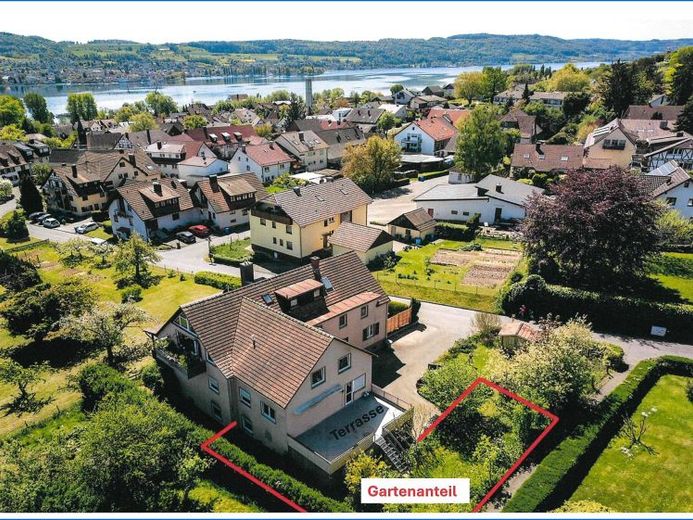 4 Zi. Whg. im 1.OG in unmittelbarer Seenähe mit Balkon, Terrasse und Gartenanteil und Garage! – Foto 1