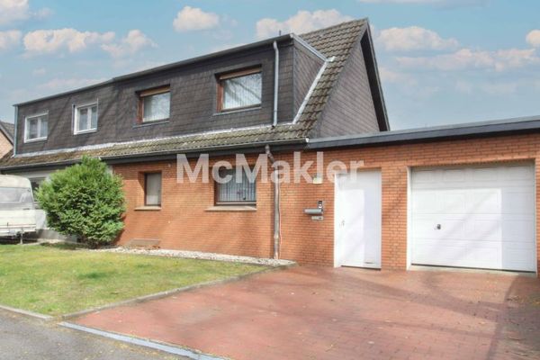 Charmante eengezinswoning met grote tuin, vijver, open haard en garage in Marl