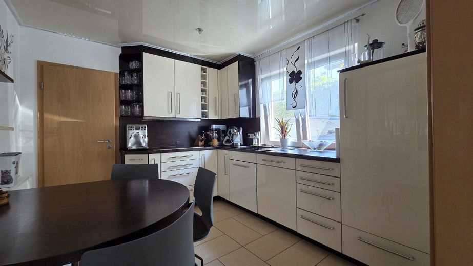 Élégante maison individuelle avec logement indépendant – Küche