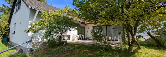 Guter Preis - 777m² Grund, Bungalow, Vollkeller, Garage in Bestlage Stadt Heusenstamm, ruhig gelegen – Südansicht Sommer