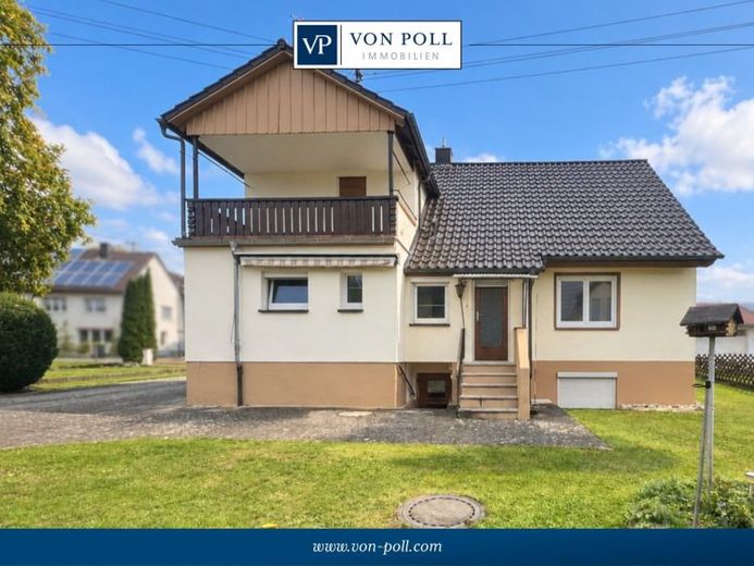 Platz für Ihre Wohnideen – Einfamilienhaus mit großem Garten und zwei Garagen – Foto 1