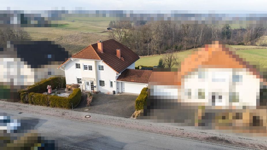 Einfamilienhaus mit Einliegerwohnung, Doppelgarage und Garten. Willkommen in Horhausen! – Blick von oben