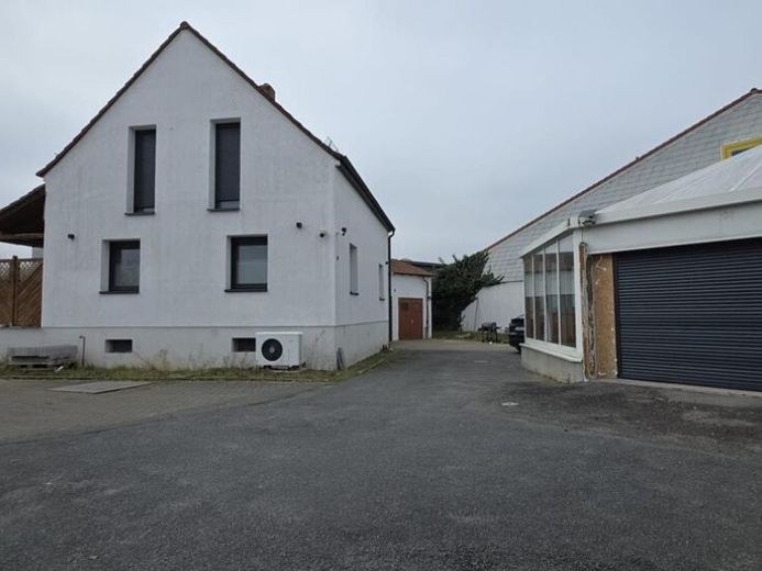 Eccezionale proprietà con forte rendimento con casa unifamiliare e unità commerciale in posizione top – Foto 1