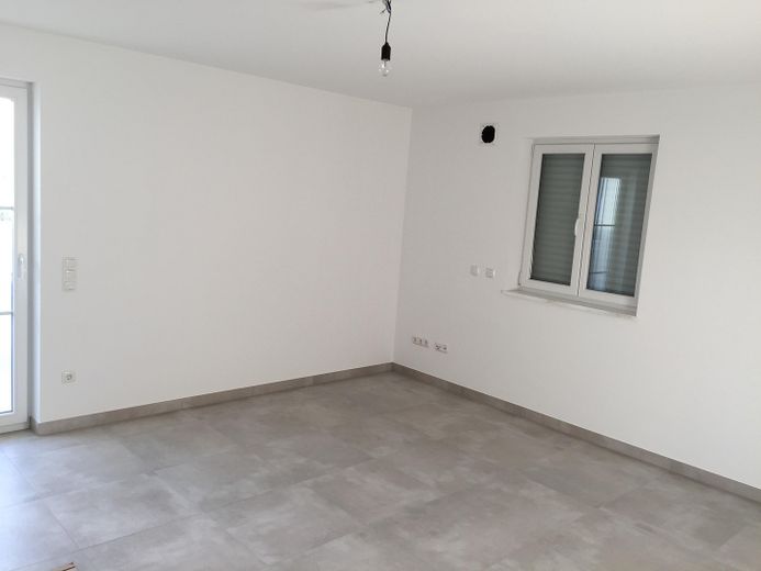 Schlafzimmer mit Balkonzugang