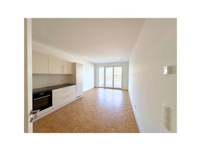 *Stilvolles Wohnen*: Lichtdurchflutete 2-Zi.-Wohnung mit Balkon im Projekt "Teltrio" – Ansicht I: Wohn- und Esszimme…