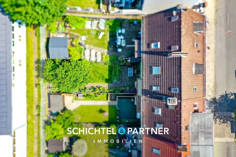Ohlenhof | Ansprechendes Reihenmittelhaus mit Balkon und Terrasse – S&amp;P | Grundstücksansicht