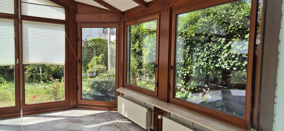 120 m² का गर्म विंटरगार्डन, टैरेस और बगीचे सहित – Schleswig में असाधारण अपार्टमेंट – Wintergarten