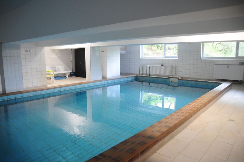 Zentral wohnen mit Wellness-Komfort – Schwimmbad im Haus