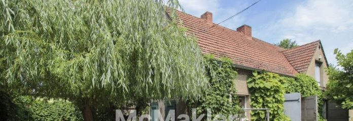 Ein Anwesen voller Möglichkeiten – Charmantes Einfamilienhaus mit tollem Atelier auf ca. 220m² NF