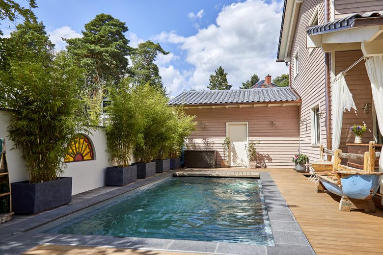 Luxueus Baufritz-houten huis in New England-stijl in de bosvillawijk – Naturpool