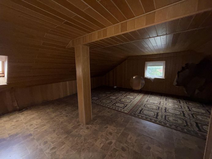 Ein- oder Zweifamilienhaus auf großzügigem Grundstück in zentraler Lage von Harsewinkel – DG Raum