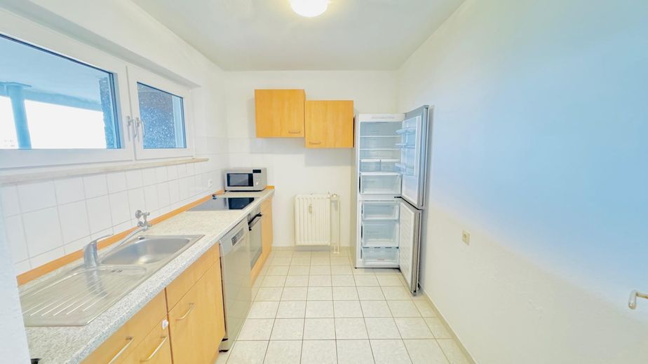 Helle 2-Zimmer-Wohnung mit Südbalkon, Weitblick und TG nahe MHH – Küche