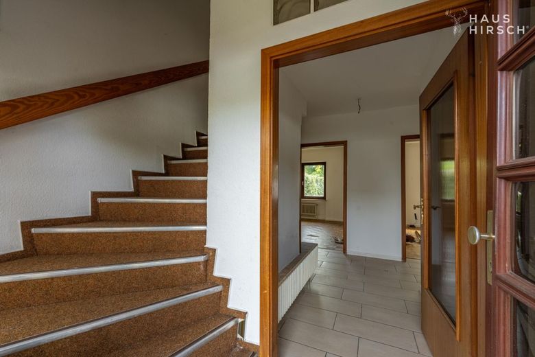 Doppelhaushälfte mit 5 Zimmern auf 133 m² in Boostedt zu kaufen – Eingangsbereich / Treppe