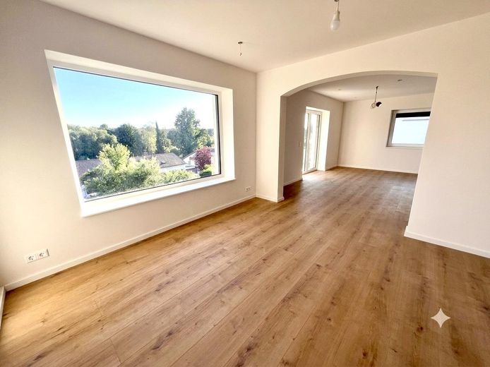 Erstbezug Möhringen: Stilvolle 3,5-Zi.-Etagenwohnung mit Kamin, Balkon & Garten – Wohn- und Essbereich 1