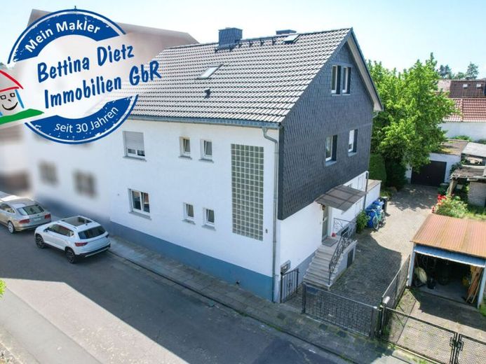 DIETZ: Gut geschnittenes 2-Familienhaus mit Garten, Garage und Nebengebäude in Babenhausen Langstadt – Foto 1