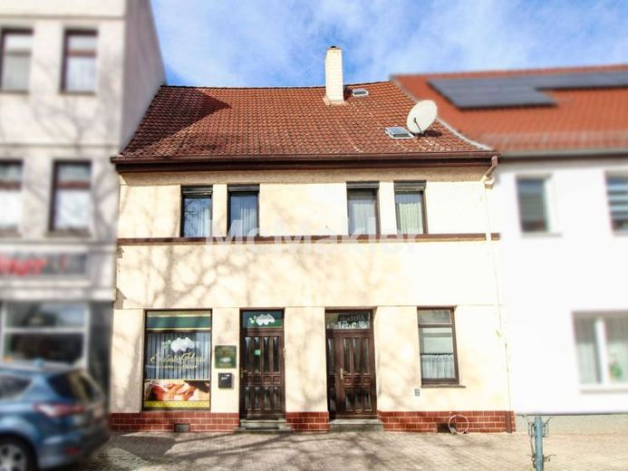 VB: Charmantes Einfamilienhaus mit zusätzlicher Einnahmequelle durch Gewerbeeinheit – Foto 1
