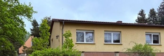 **Massiv unterkellertes EFH im Bungalowstil mit Tiefgarage und großem Grundstück im Töpferort**