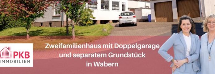 Wohnen im Grünen: Attraktives Zweifamilienhaus mit viel Platz und Doppelgarage