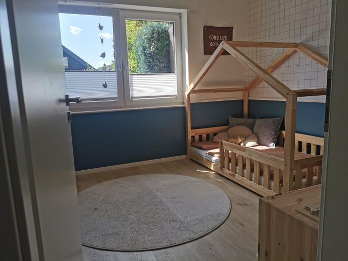 Esclusivo appartamento maisonette di 4,5 locali con giardino a Meerbusch Büderich – Kinderzimmer 2 mit Gartenblick