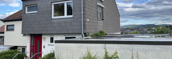 Hoekwoning in een rij met dakterras & panoramisch uitzicht – lichte droom voor gezinnen – Eingang