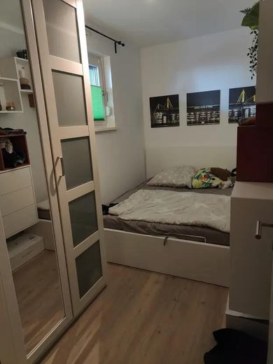 Stylowe mieszkanie na parterze z 3 pokojami, w tym miejsce parkingowe w garażu podziemnym – Schlafzimmer