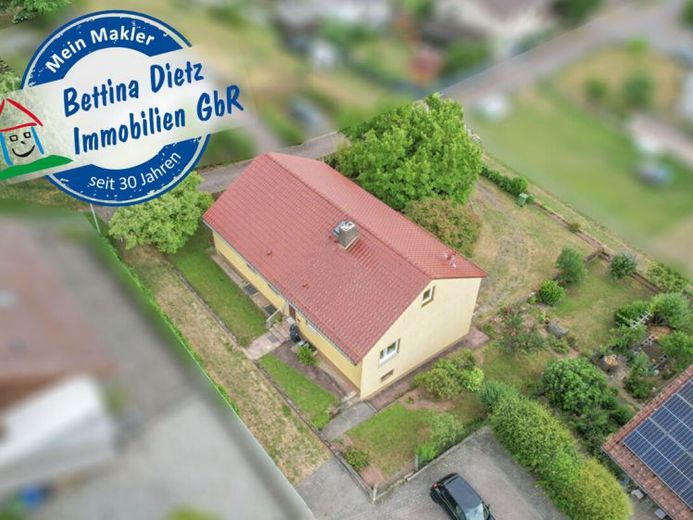 DIETZ: Gepflegter Bungalow mit Garten, Garage und Keller in herrlicher Lage von Wiebelsbach! – Foto 1