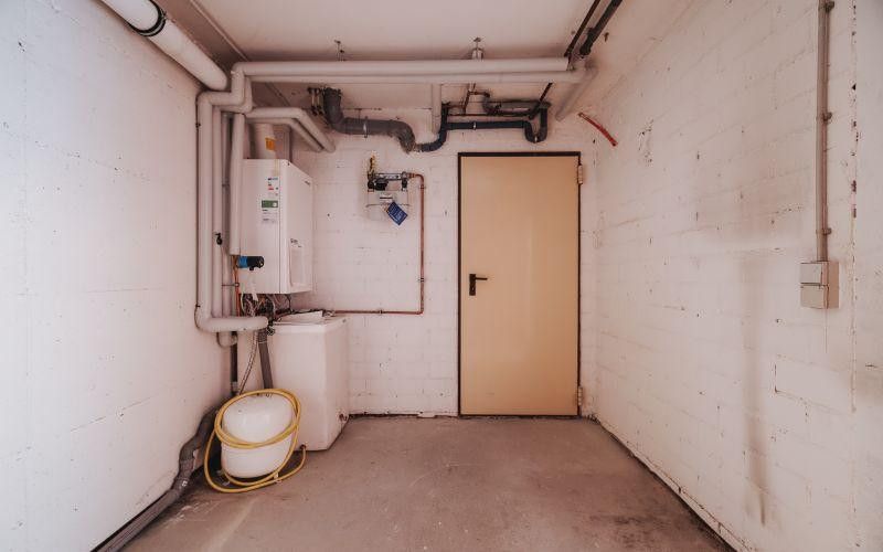 Eigentumswohnung im Charakter einer Doppelhaushälfte mit Garten in Umkirch – UG Vorratsraum mit Gastherme