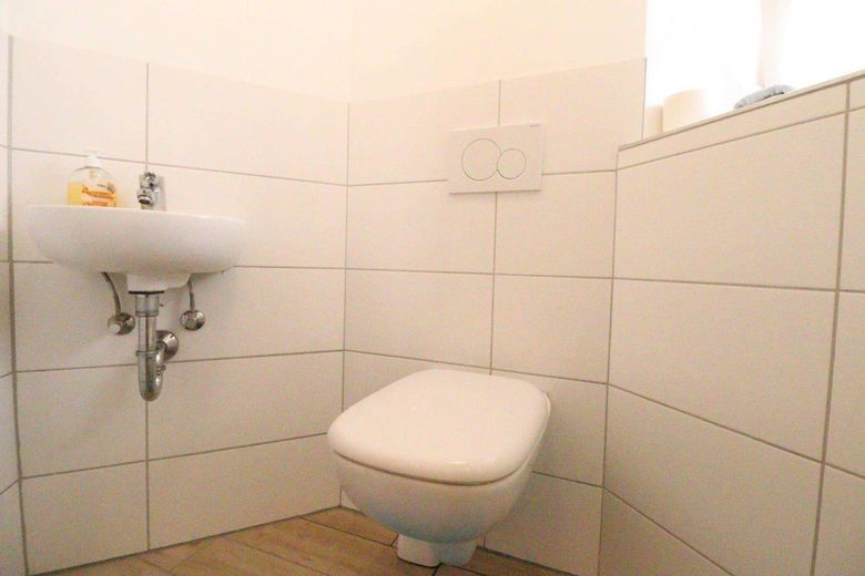 WRS Immobilien - Freudenberg - direkt im Zentrum + am Main - saniertes EFH mit Einzelgarage – Gäste-WC - EG