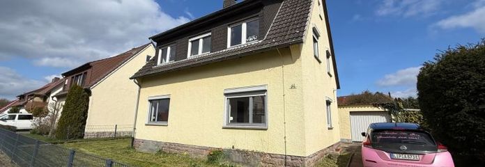 Großzügiges Einfamilienhaus mit Garten und Garage in gepflegter Siedlung
