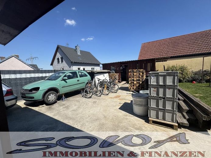 Charmantes Einfamilienhaus mit großem Garten, Garage und viel Platz für die ganze Familie - Ein Objekt von Ihrem Immobilienpartner SOWA Immobilien und Finanzen – Bild 11